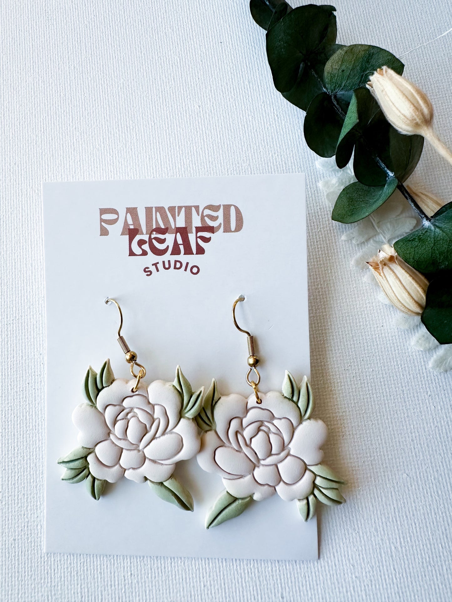 White Floral Circle Earrings